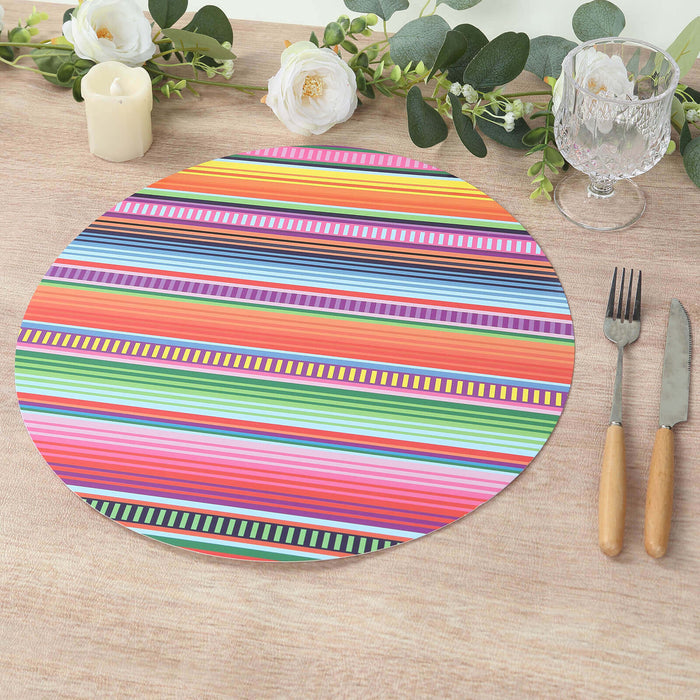 Colorful striped round placemat on a wooden table setting.