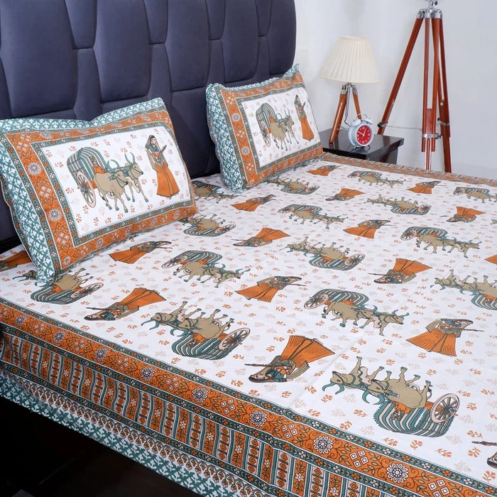 Jaipuri cotton bed sheet featuring vibrant traditional prints with matching pillows for an elegant bedroom look.