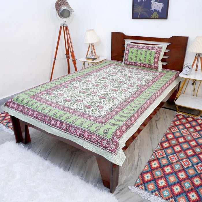 The Jaipuri pure cotton bed sheet online with intricate floral patterns and matching pillow cover