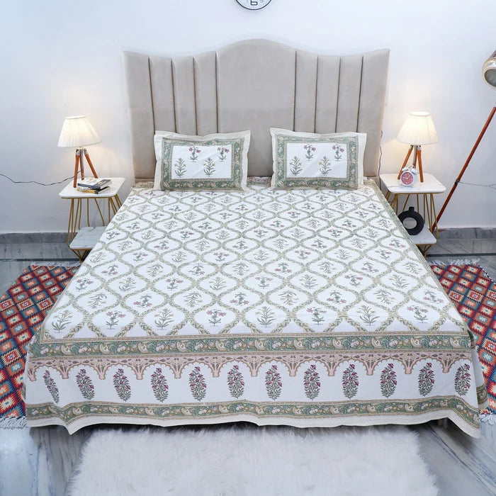 Jaipuri cotton bed sheet with floral design and matching pillow covers for elegant bedroom decor