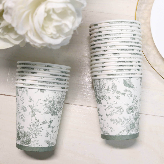 Floral design disposable cups stacked on a table.