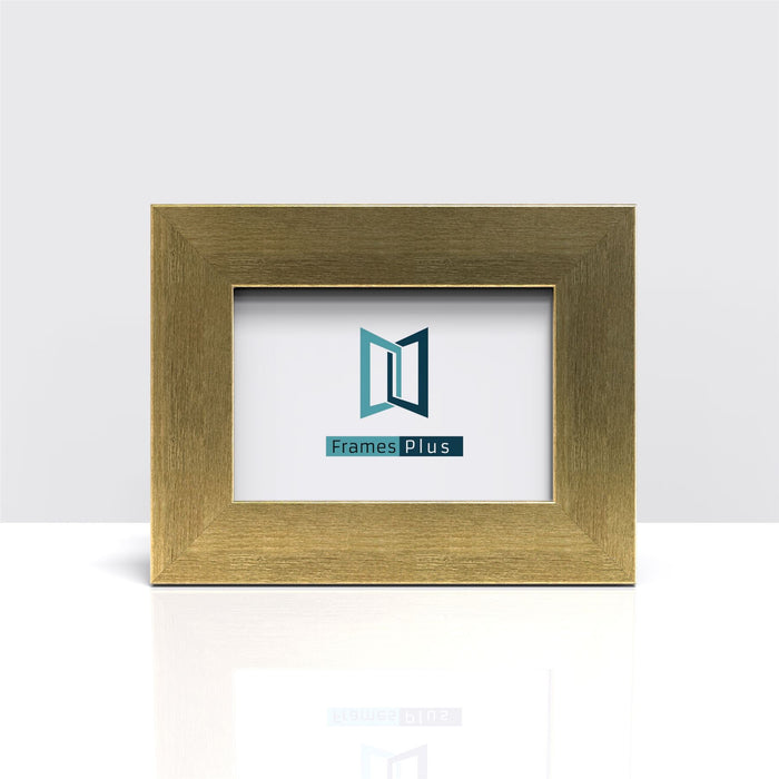 Gold picture and poster frame showcasing the Frames Plus logo in a modern style.