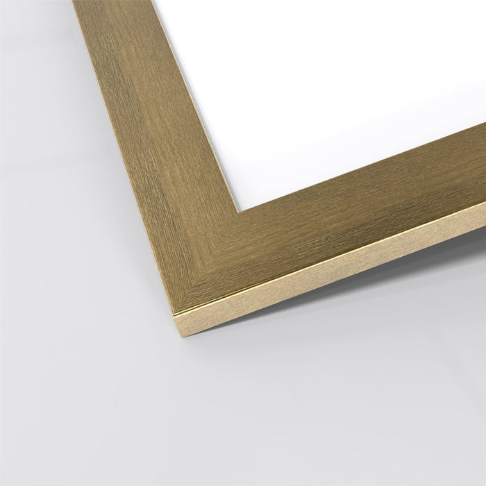 Close-up of a quality gold picture and poster frame with a smooth finish and sturdy edges.