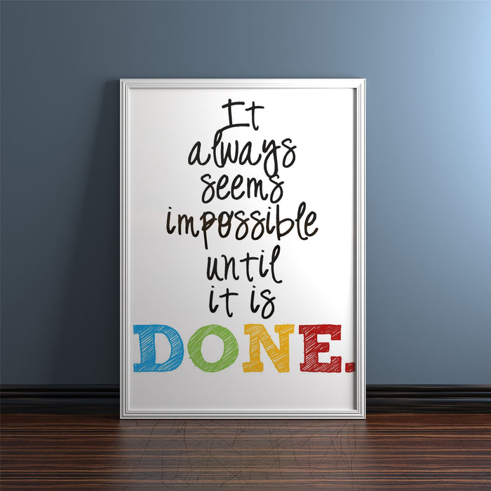 White picture and poster frame displaying an inspirational quote about achieving the impossible.