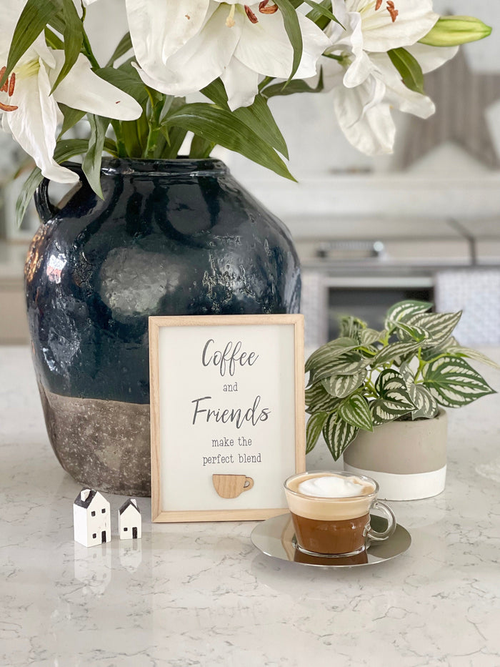 Framed 'Coffee and Friends ...' sign