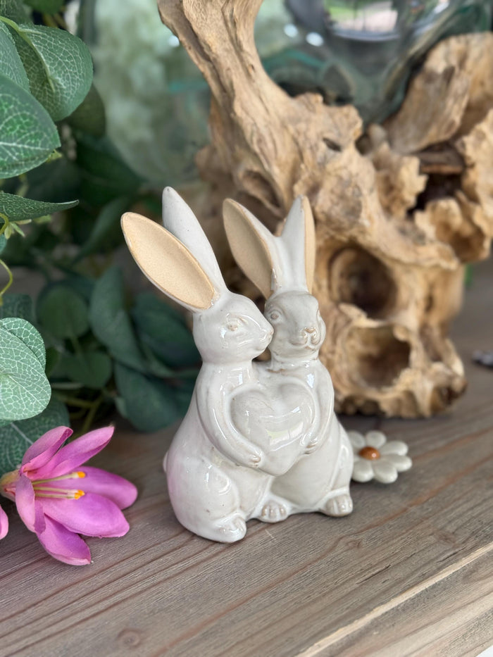 Glazed Ceramic Hugging Bunnies.