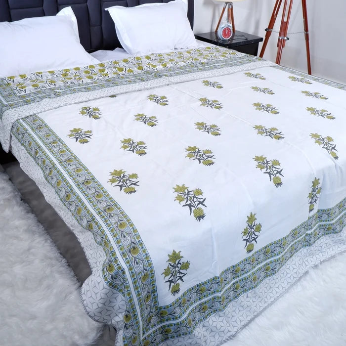 Hand block print mulmul dohar in white with floral patterns, perfect for stylish bedding.