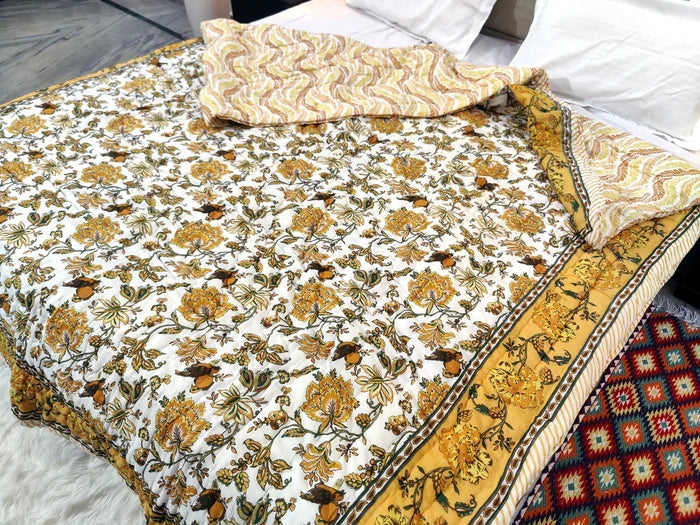 Jaipuri cotton quilt double bed featuring floral patterns in vibrant colors for cozy bedding