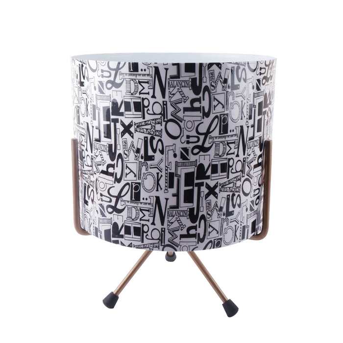 Designer metal flower pot with modern print and tripod legs for stylish indoor gardening