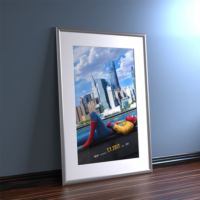 A vibrant silver picture frame with white mount displaying a poster of a superhero in a cityscape.