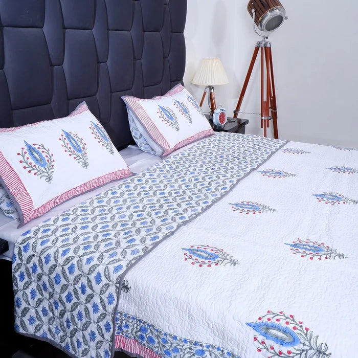 Hand block print cotton bedcover with colorful floral patterns for stylish bedroom decor