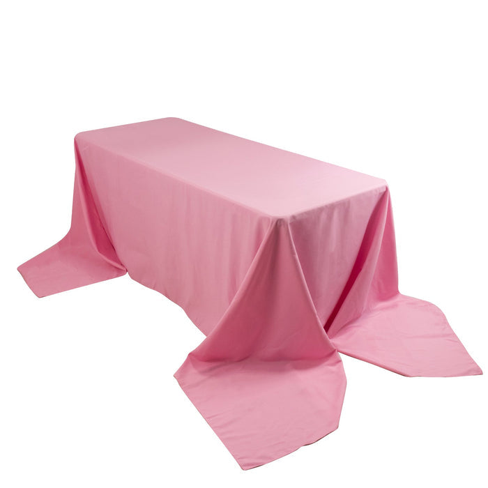 Pink rectangular tablecloth with draped edges
