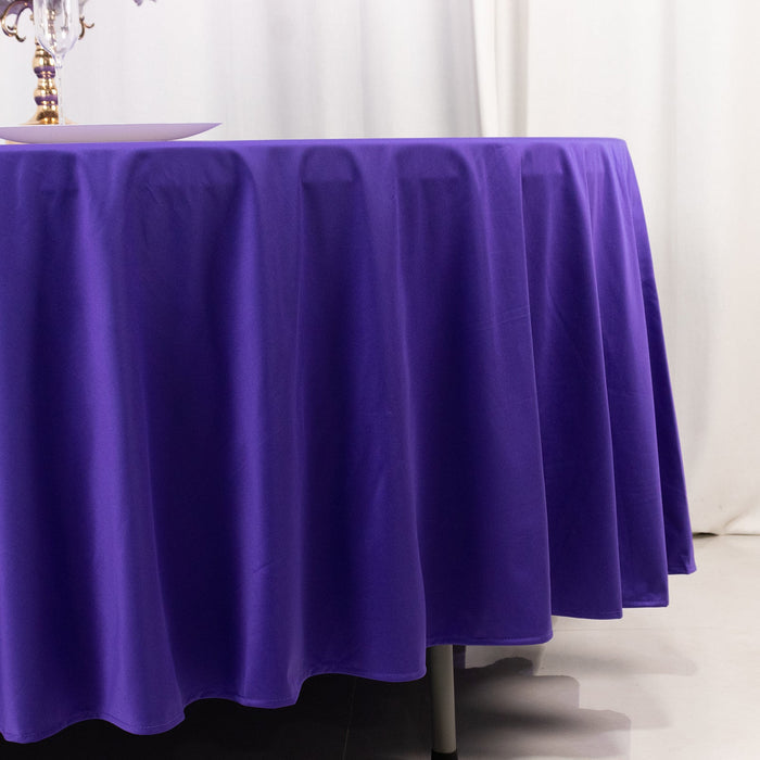 Purple tablecloth draped elegantly over a table.