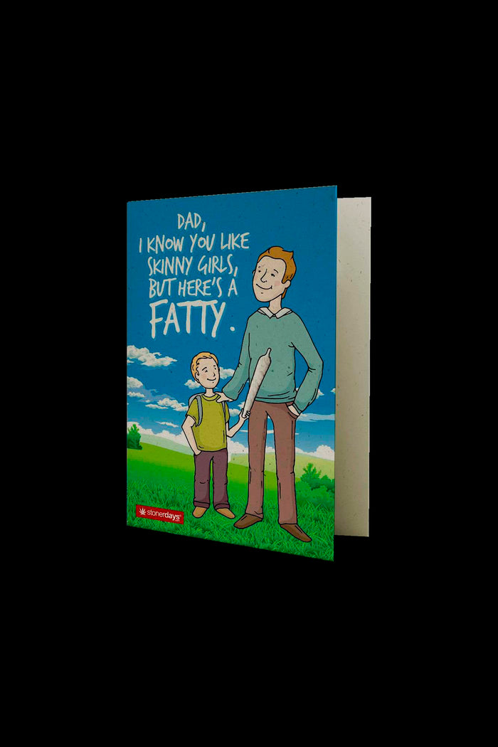 A greeting card with a cartoon illustration of a tall man and a young boy standing in a field with the text "Dad, I know you like skinny girls, but here's a fatty." and the StonerDays logo.